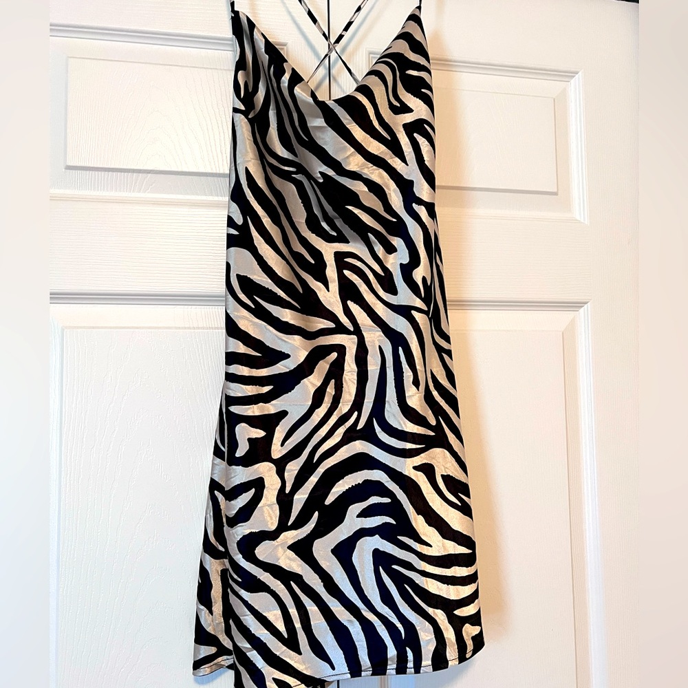 Super cute satin dress with straps and open back